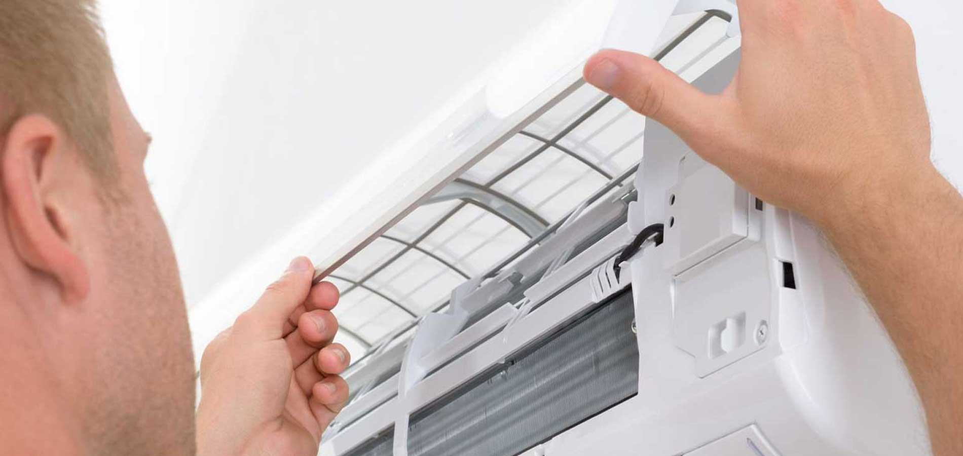 Man Fixing AC